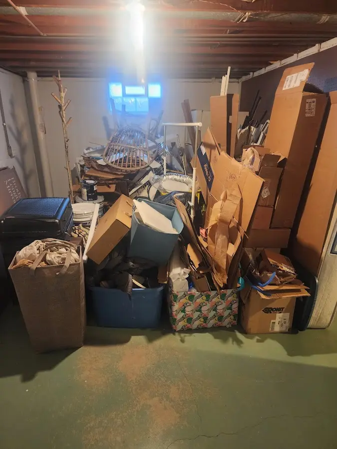 Roll-off dumpster container at job site for 2 Yard Dumpster Rental in Kendall